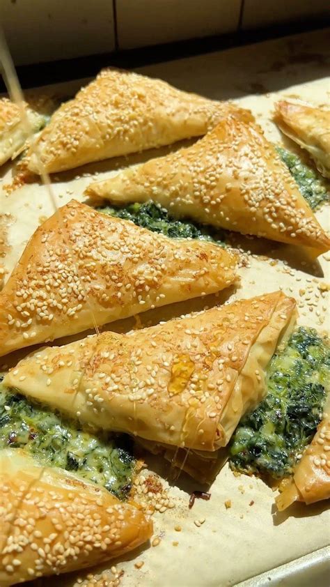 half filo|Spinach and Brie Triangles. .